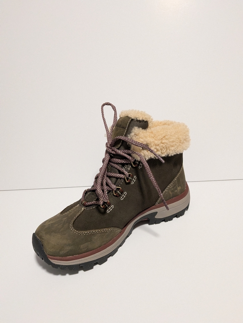 Eddie Bauer Rainier waterproof mid boots feature a faux fur lining and durable